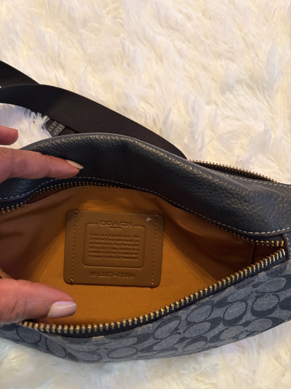 Coach Men’s Black Leather Messenger Bag with Tan Interior